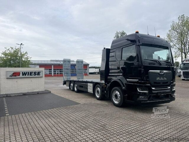 Autotransporter MAN Baumaschinen Maschinentransporter mit Rampen