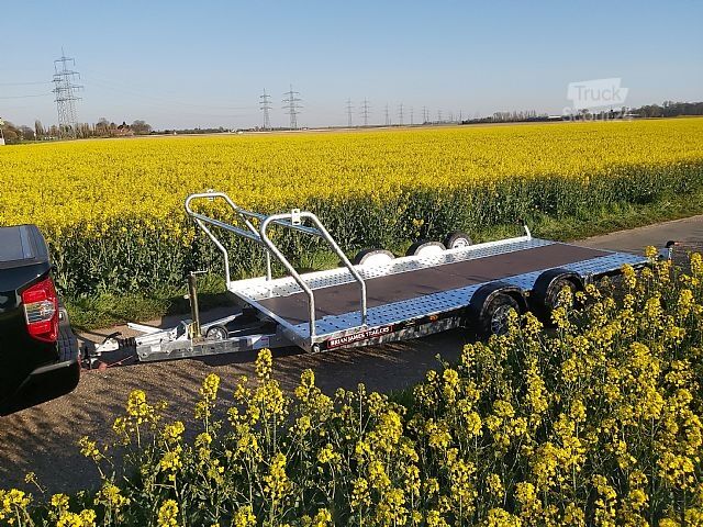 Autotransportieris Brian James Trailers A4 Motorsport Trailer Aluf. Reifenregal