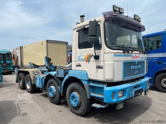 Caminhão para fins especiais MAN Steyr 32.403 Silent 8x4 Sülo Aufsteller Bj