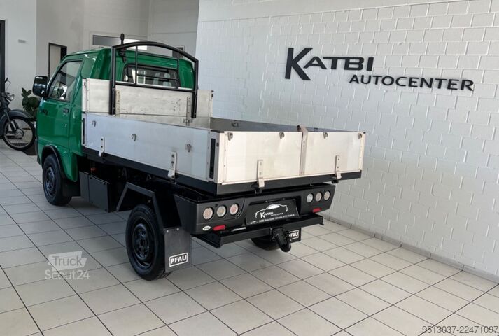 Самосвал-фургон PIAGGIO Porter 1.3 Allrad 4x4 Kipper Stdhz 1. Hand HUneu