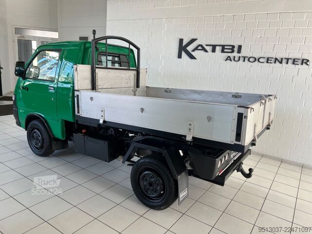 Самосвал-фургон PIAGGIO Porter 1.3 Allrad 4x4 Kipper Stdhz 1. Hand HUneu