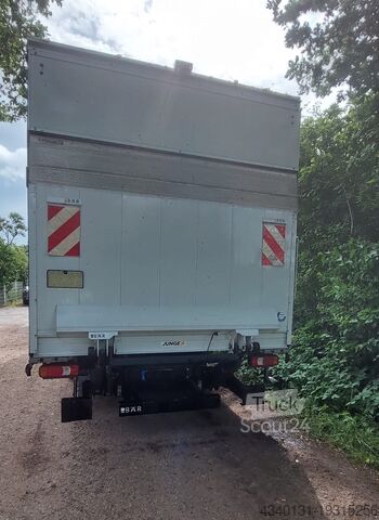 Lastbil med flak och presenning Iveco 70C18HA8/P