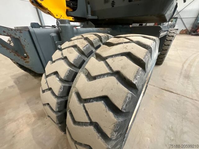 Kolesni bager Neuson EW 65