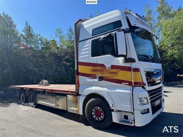 Plattformanhänger MAN TGX 580 Flatbed truck.