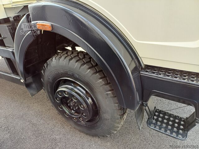 Flatbed Mercedes-Benz 1017 5t 4x4 Dropside plate