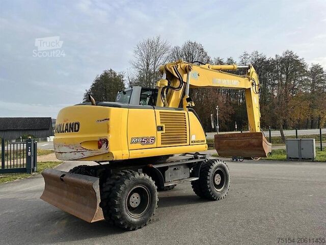 Escavatore cingolato New Holland MH 5.6 inkl. Grabenlöffel, Tieflöffel