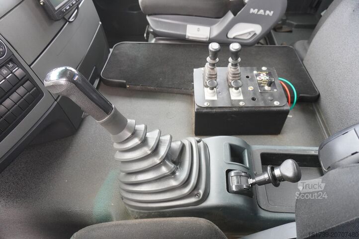 Vidanjör MAN TGS 35.400 8x4 E5 / HYVA HOOK LIFT 32.56