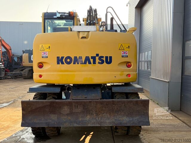 Máquina de manuseamento de materiais Komatsu PW148-10