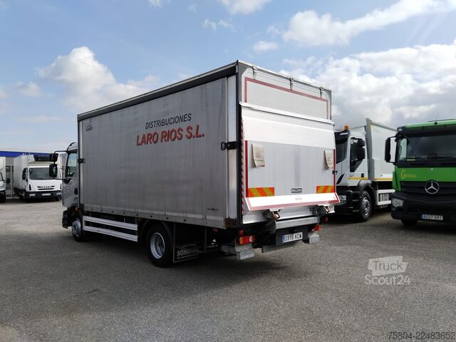 Ladbil med presenning Volvo FL 240