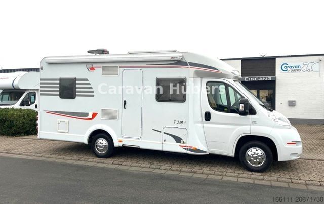 Ημιενσωματωμένο αυτοκινούμενο τροχόσπιτο CARADO T 348 - Hub/Festbett - Klima - Garage -