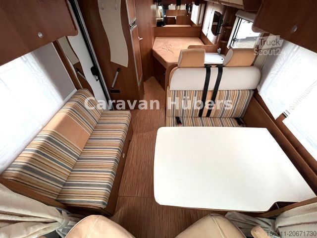 Ημιενσωματωμένο αυτοκινούμενο τροχόσπιτο CARADO T 348 - Hub/Festbett - Klima - Garage -