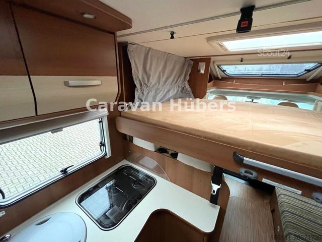 Ημιενσωματωμένο αυτοκινούμενο τροχόσπιτο CARADO T 348 - Hub/Festbett - Klima - Garage -