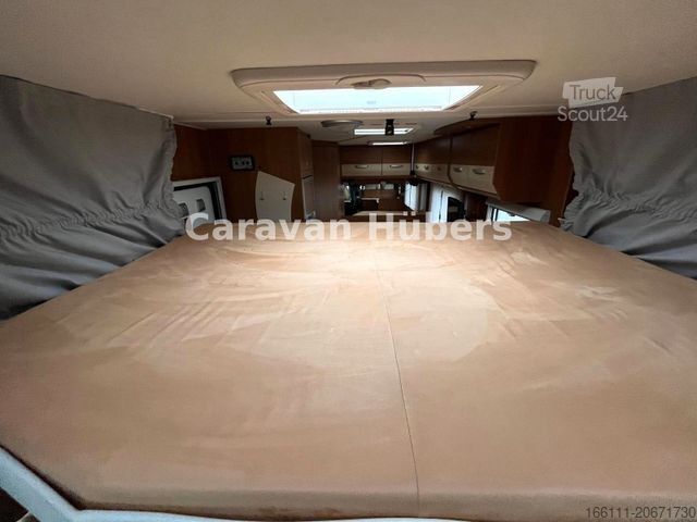 Ημιενσωματωμένο αυτοκινούμενο τροχόσπιτο CARADO T 348 - Hub/Festbett - Klima - Garage -