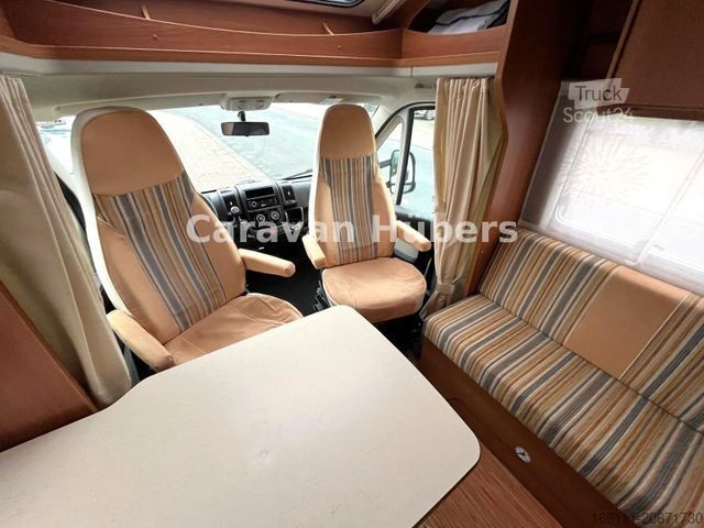 Ημιενσωματωμένο αυτοκινούμενο τροχόσπιτο CARADO T 348 - Hub/Festbett - Klima - Garage -