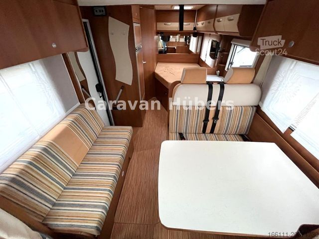 Ημιενσωματωμένο αυτοκινούμενο τροχόσπιτο CARADO T 348 - Hub/Festbett - Klima - Garage -