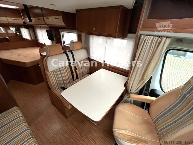 Ημιενσωματωμένο αυτοκινούμενο τροχόσπιτο CARADO T 348 - Hub/Festbett - Klima - Garage -