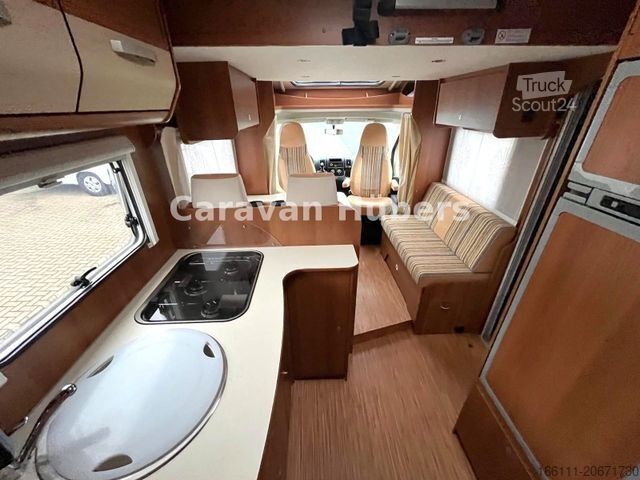 Ημιενσωματωμένο αυτοκινούμενο τροχόσπιτο CARADO T 348 - Hub/Festbett - Klima - Garage -