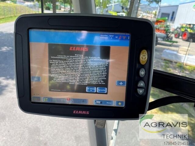 Tractor Claas XERION 4000 SADDLE TRAC + Zunhammer 11 CBM Aufsatz