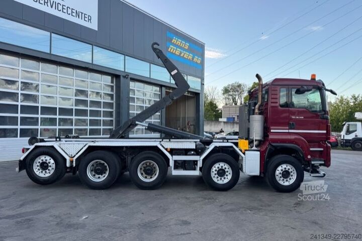 Kanca kasalı yük kamyonu (roll-off) MAN TGS 35.500 10x4 Trösch