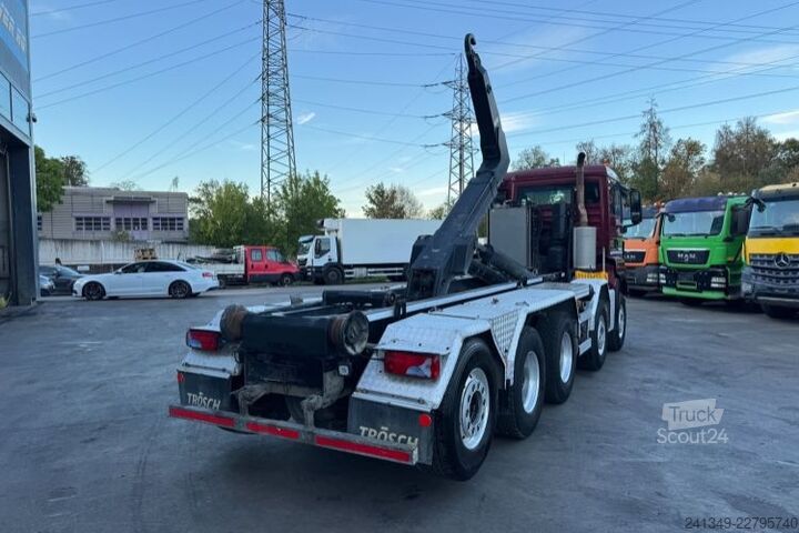 Kanca kasalı yük kamyonu (roll-off) MAN TGS 35.500 10x4 Trösch