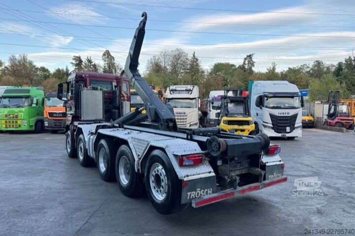 Kanca kasalı yük kamyonu (roll-off) MAN TGS 35.500 10x4 Trösch