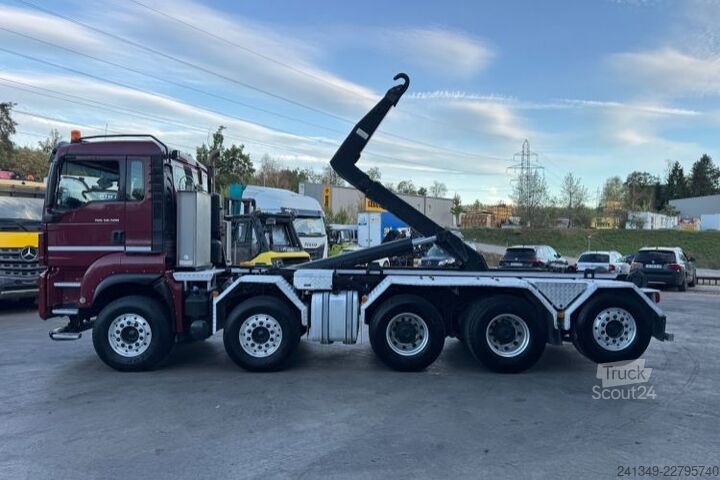 Kanca kasalı yük kamyonu (roll-off) MAN TGS 35.500 10x4 Trösch