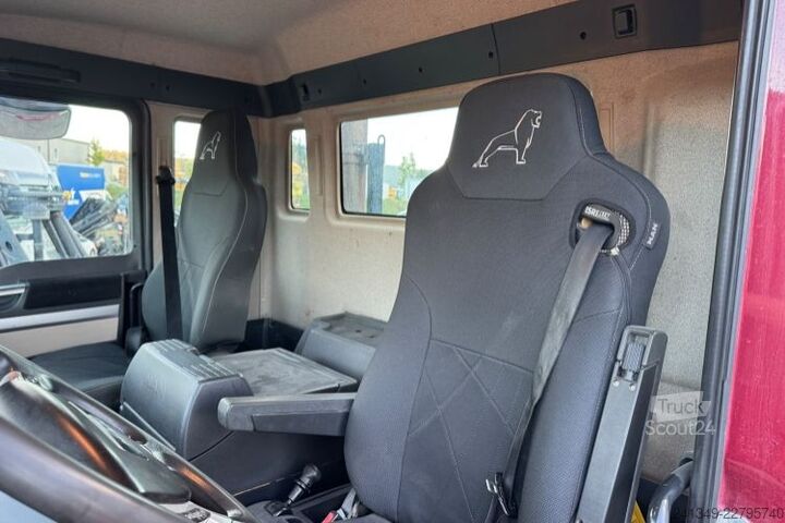 Kanca kasalı yük kamyonu (roll-off) MAN TGS 35.500 10x4 Trösch