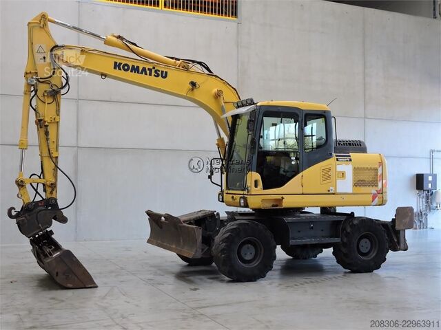 Pyöräalustainen kaivinkone KOMATSU PW140
