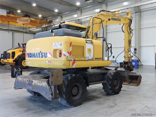 Pyöräalustainen kaivinkone KOMATSU PW140