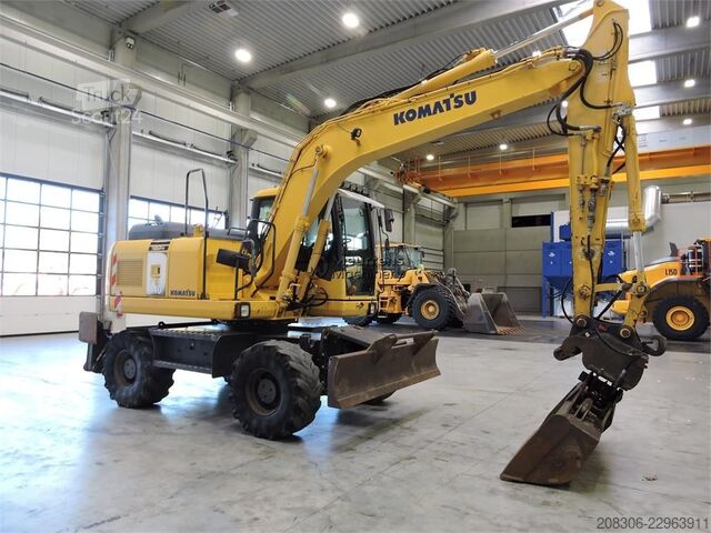 Pyöräalustainen kaivinkone KOMATSU PW140