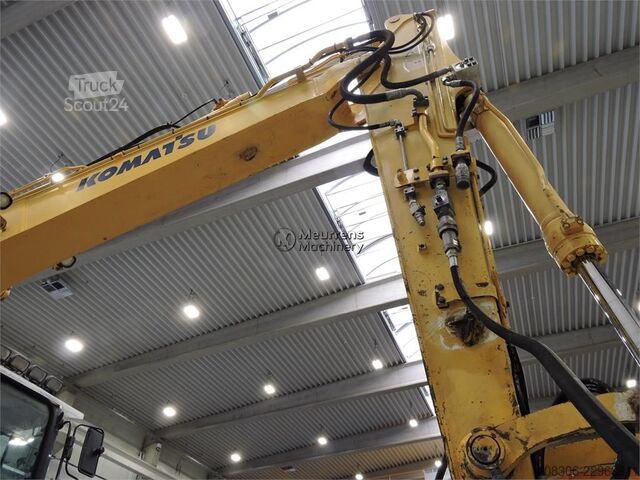 Pyöräalustainen kaivinkone KOMATSU PW140