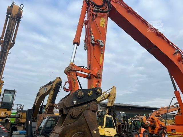 Гусеничный экскаватор KOMATSU Komatsu HB 215 LC-1