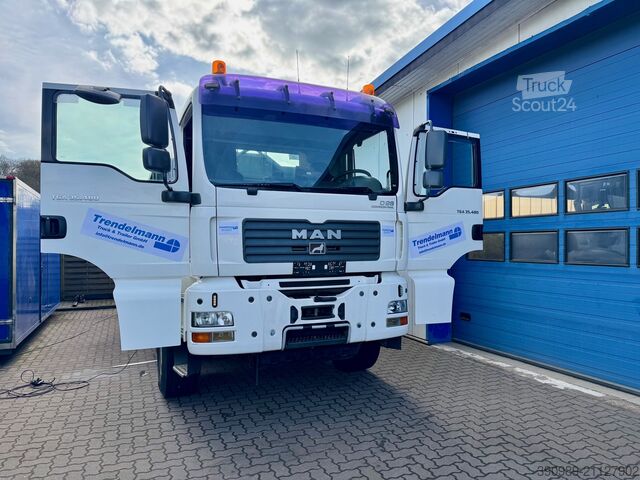 Kiper kamion MAN TGA 35.480 8X4 Abroller mit Container