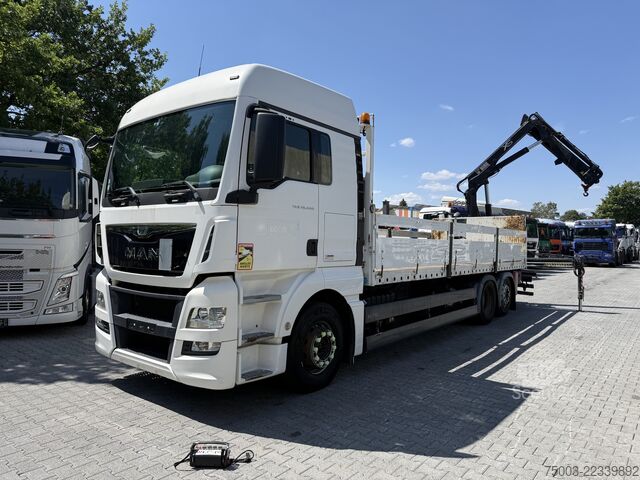 شاحنة مسطحة MAN TGX 26.440 6X2 Kran Hiab 144