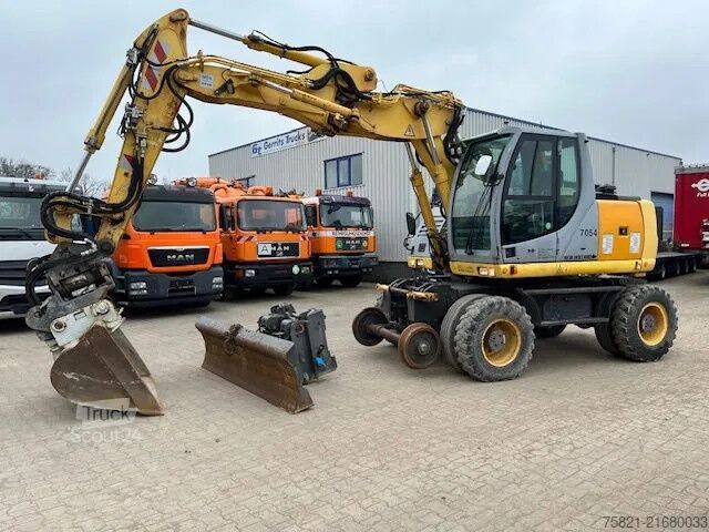 Escavatore gommato New Holland MH Plus 2wege Bagger