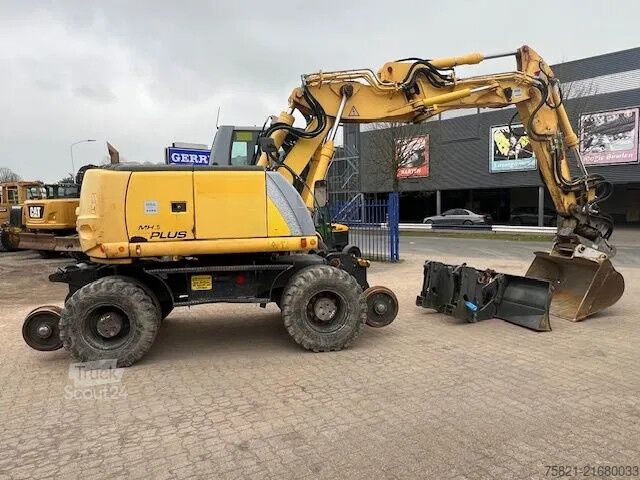 Escavatore gommato New Holland MH Plus 2wege Bagger