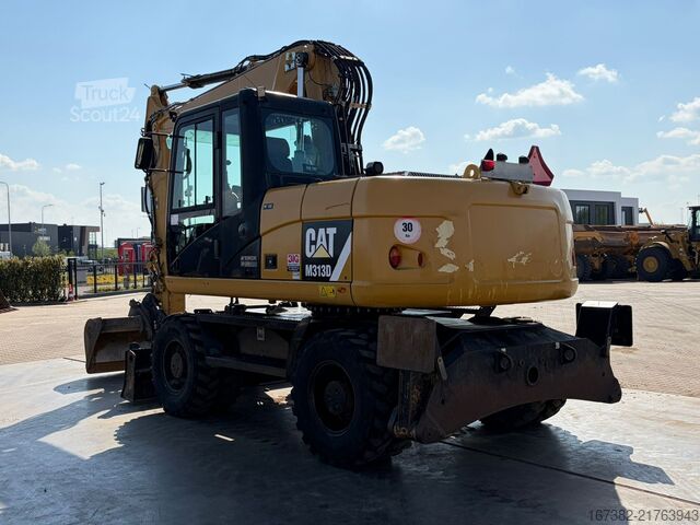 Колесен багер Caterpillar M313D VA - Outriggers + Blade