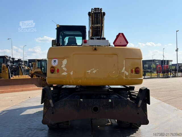 Колесен багер Caterpillar M313D VA - Outriggers + Blade