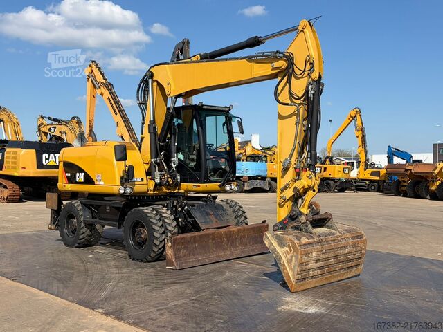 Колесен багер Caterpillar M313D VA - Outriggers + Blade