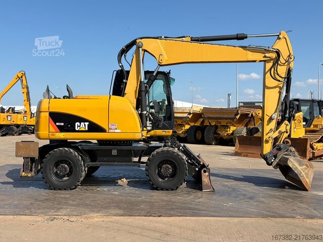 Колесен багер Caterpillar M313D VA - Outriggers + Blade