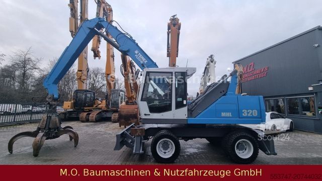 Pelle sur pneus FUCHS MHL 320 / ZSA / AC / Hochfahrbare Kabine /