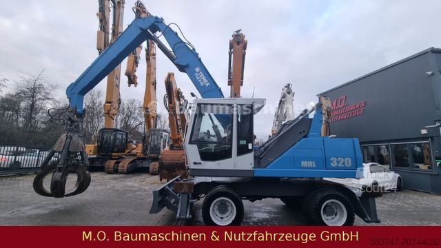 Pelle sur pneus FUCHS MHL 320 / ZSA / AC / Hochfahrbare Kabine /