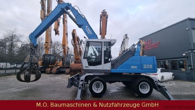 Pelle sur pneus FUCHS MHL 320 / ZSA / AC / Hochfahrbare Kabine /