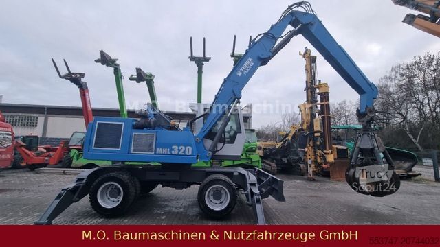 Pelle sur pneus FUCHS MHL 320 / ZSA / AC / Hochfahrbare Kabine /