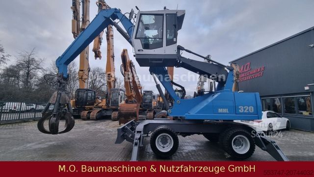 Pelle sur pneus FUCHS MHL 320 / ZSA / AC / Hochfahrbare Kabine /