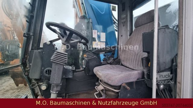 Pelle sur pneus FUCHS MHL 320 / ZSA / AC / Hochfahrbare Kabine /