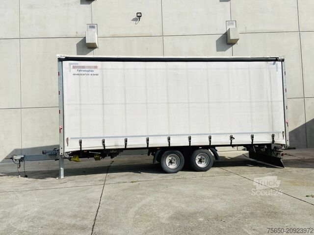 Відкритий причіп з тентом Möslein TP 11 Schwebheim  Tandem- Schiebeplanenanhänger zum Durchladen