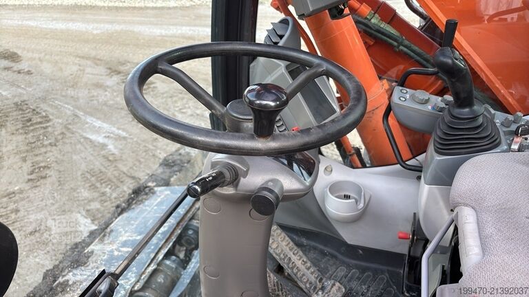 Tekerlekli ekskavatör Hitachi ZX145W-6