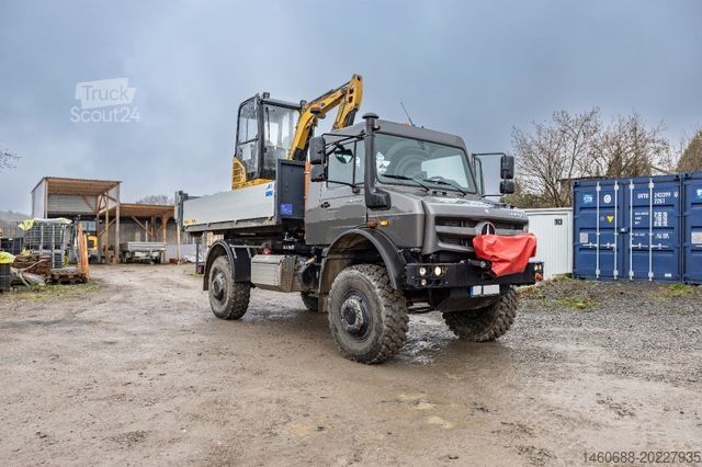 Speciallastbil MERCEDES-BENZ Unimog U5023 als Abrollkipper mit Hakenlift