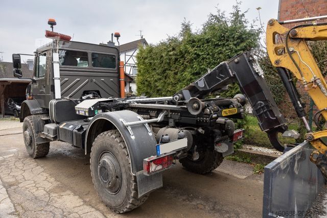 Autocamion cu destinație specială UNIMOG Unimog U5023 als Abrollkipper mit Hakenlift